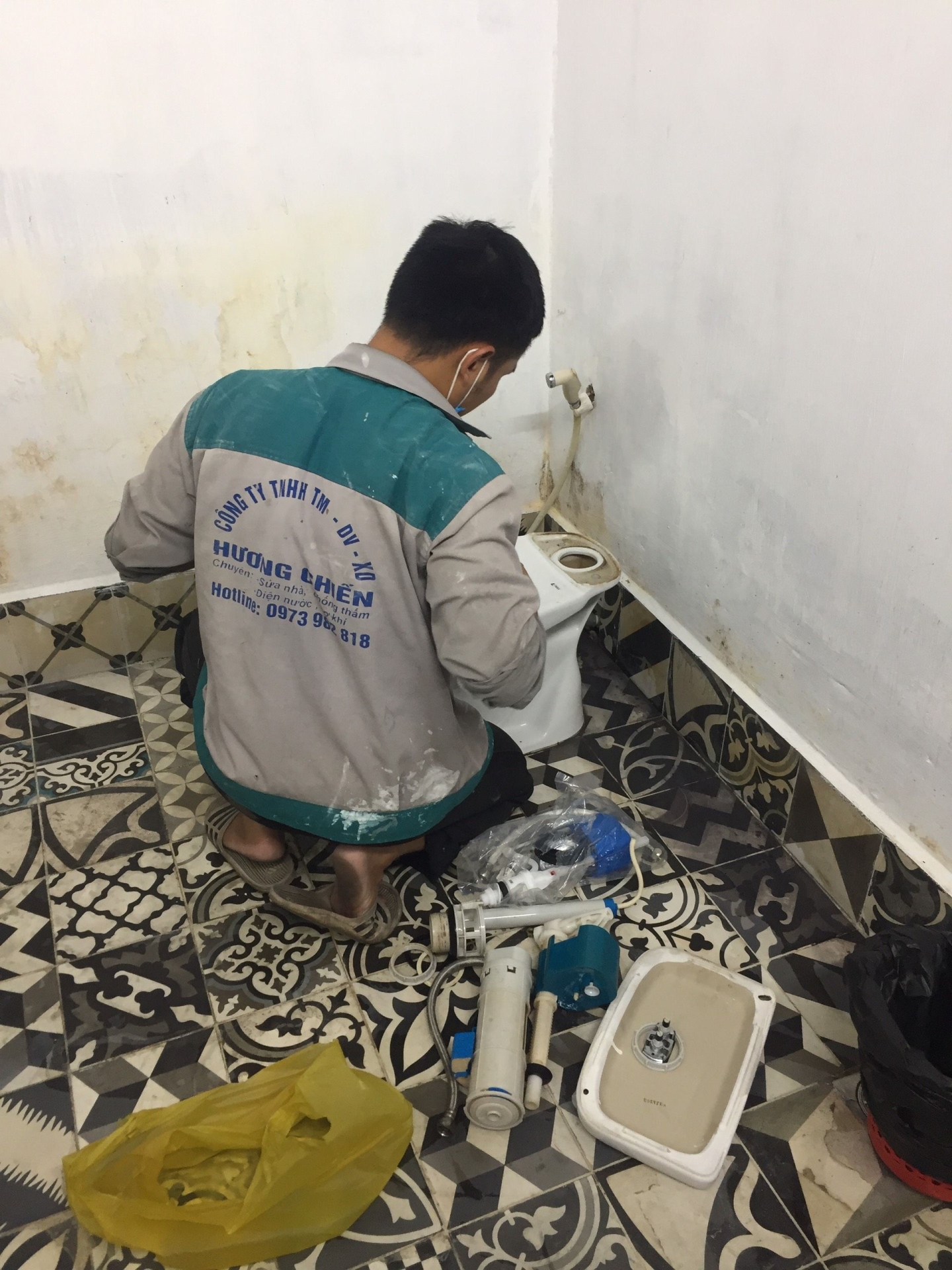 Thợ sửa bồn cầu